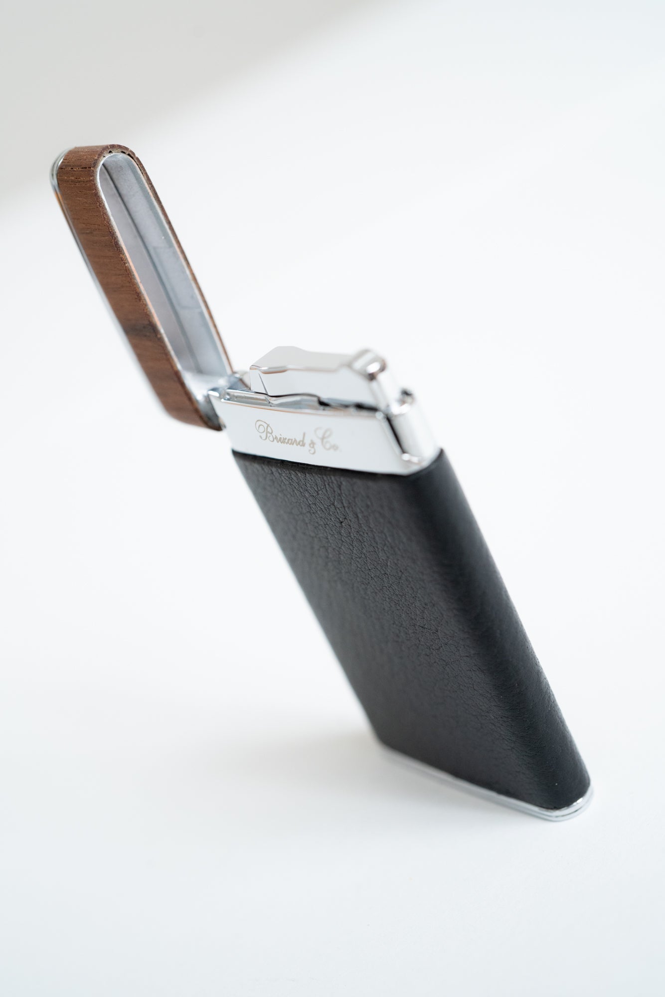 high-end cigar accessory Brizard & Co. The Sottile Lighter – Dakota Black. Wrapped in hand-selected Dakota Black leather