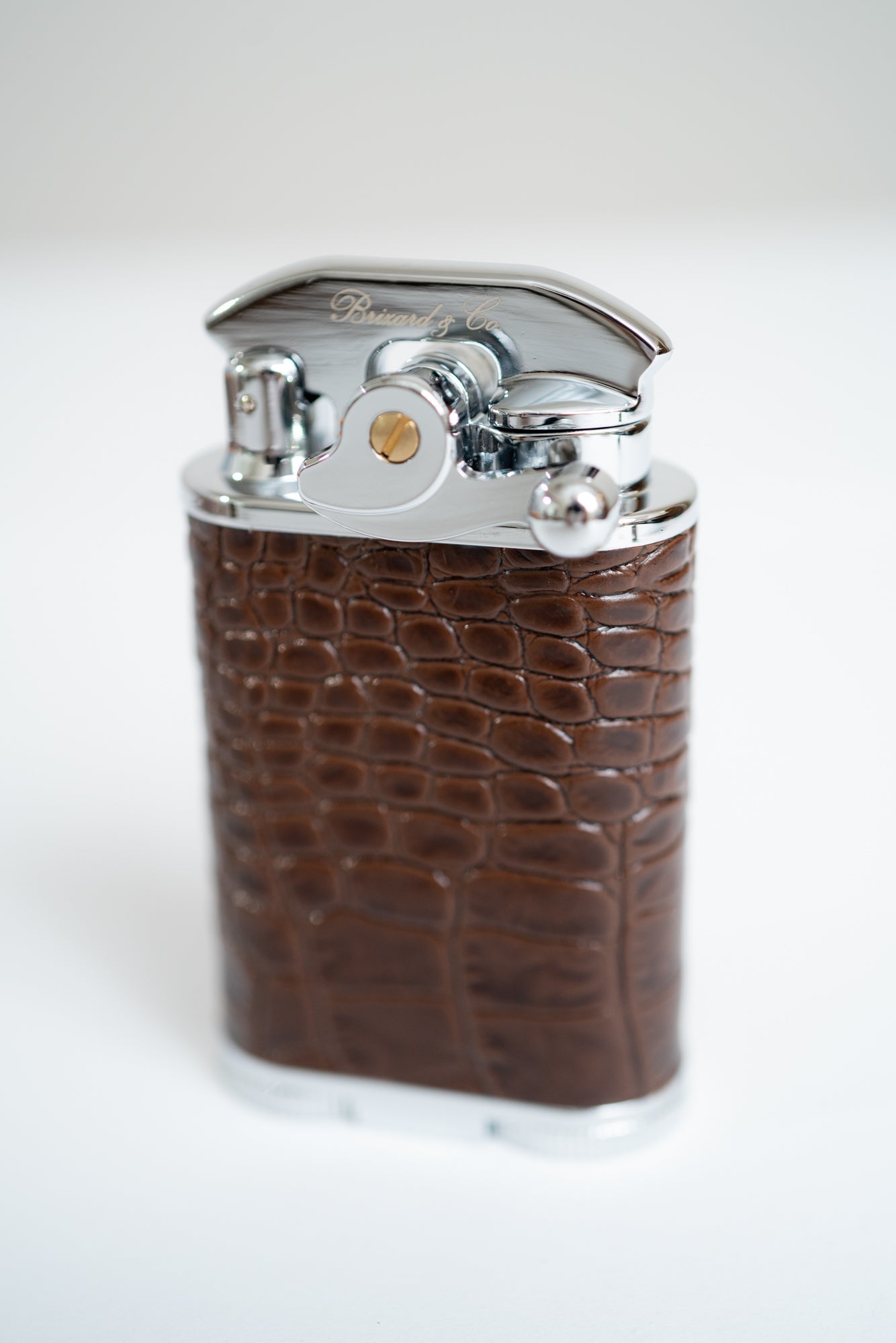 Gatsby Table Lighter crafted with a genuine leather finish in a refined crocodile pattern.