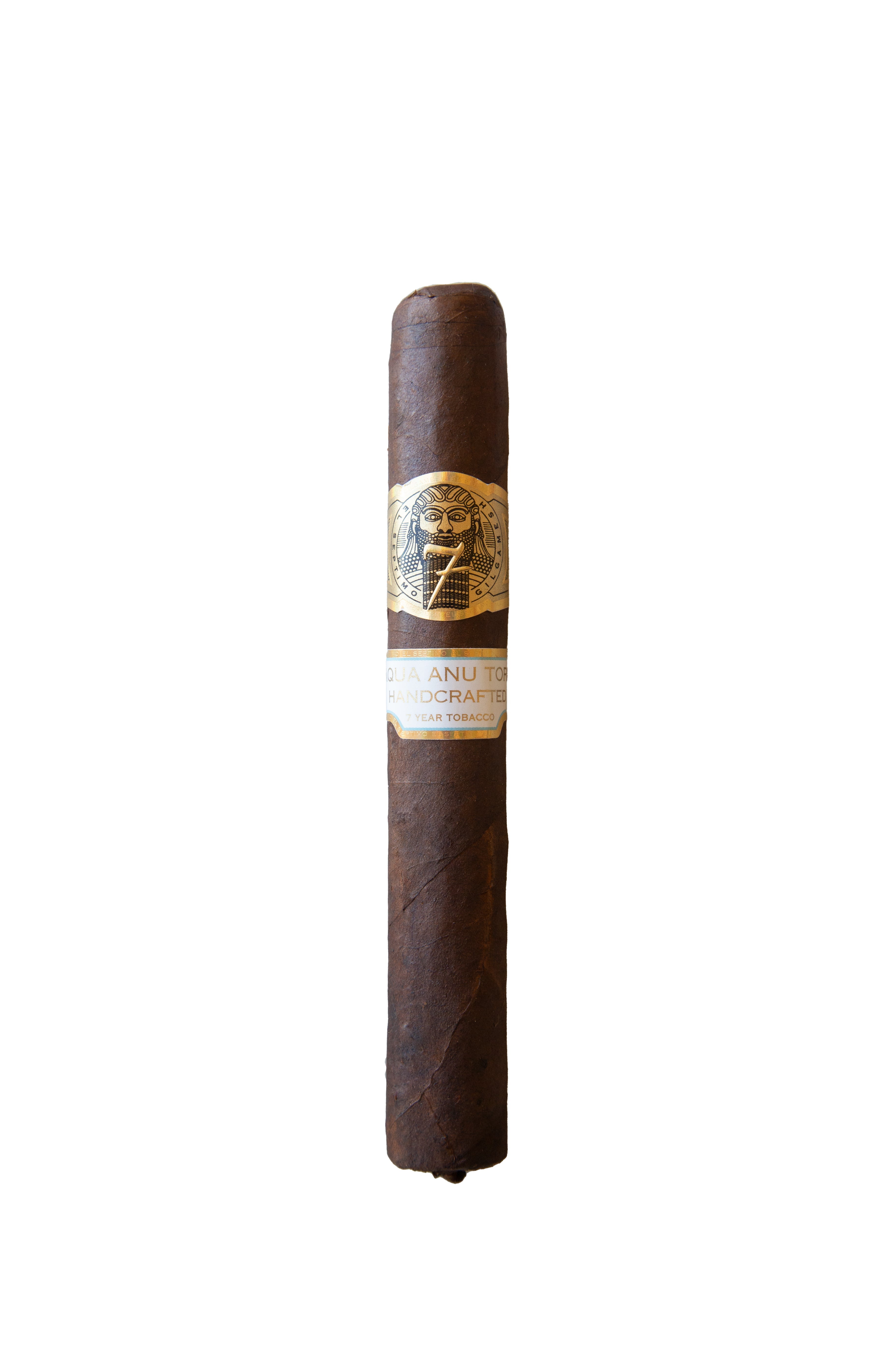 El Septimo Aqua Anu Toro A single cigar with a dark, oily wrapper, featuring a band with gold text and design, resting against a white background.